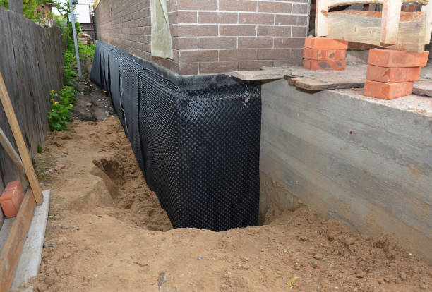 Happy homeowners after waterproofing job in Uniondale